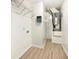 Utility room with vinyl flooring, wire racks and newer HVAC system at 14315 Knoll Ridge Dr, Tampa, FL 33625