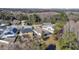 Aerial view of a residential area, showing houses and landscape at 15727 Cedar Elm Ter, Land O Lakes, FL 34638