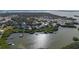 Aerial view of waterfront homes and community at 7092 Baypine Ln, Englewood, FL 34224