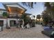 Expansive backyard oasis with pool and fire pit at 7092 Baypine Ln, Englewood, FL 34224