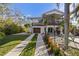 Two-story house with a two car garage and fenced yard at 7092 Baypine Ln, Englewood, FL 34224