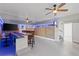 Coastal-themed bar with seating and TV in the game room at 7092 Baypine Ln, Englewood, FL 34224