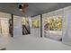 Spacious screened porch with stairs, offering a relaxing outdoor space at 7092 Baypine Ln, Englewood, FL 34224