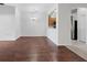 Bright dining area with hardwood floors and kitchen pass-through at 3473 Parkridge Cir # 17-101, Sarasota, FL 34243