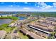 Aerial view showcasing a condo community near water at 6650 100Th N Way # 25C, St Petersburg, FL 33708