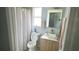 Modern bathroom with a single sink and shower at 2205 Mcgee Rd, Plant City, FL 33565
