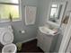 Clean bathroom with a single sink and shower/tub combo at 2205 Mcgee Rd, Plant City, FL 33565