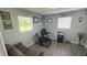 Bright home office with a desk, chair, and window providing ample natural light at 2205 Mcgee Rd, Plant City, FL 33565