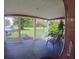 Front porch with white railings and seating area at 2205 Mcgee Rd, Plant City, FL 33565