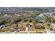 Aerial view of house and surrounding area, showcasing neighborhood and landscape at 4039 Meadow Run Ln, Wesley Chapel, FL 33543