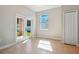 Bright laundry room with French doors leading outside at 2729 Walden Woods Dr, Plant City, FL 33566