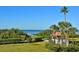 Landscaped grounds with gazebo and beach access at 7532 Bayshore Dr # 203, Treasure Island, FL 33706