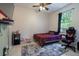 Bedroom with a queen bed and gaming chair at 4126 Cobbler Ln, North Port, FL 34286