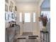 Bright and airy entryway with tile floors and decorative accents at 4126 Cobbler Ln, North Port, FL 34286
