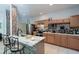 Modern kitchen with stainless steel appliances and breakfast bar at 4126 Cobbler Ln, North Port, FL 34286