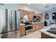 Modern kitchen with stainless steel appliances and granite countertops at 4126 Cobbler Ln, North Port, FL 34286