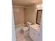 Clean bathroom featuring a tub-shower combo, tile flooring, and a vanity at 4885 Rilma Ave # 130, Sarasota, FL 34234