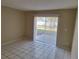 Bright bedroom with sliding door access to a private outdoor space at 4885 Rilma Ave # 130, Sarasota, FL 34234