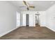 Spacious bedroom with hardwood floors and a large closet at 7326 Shepherd St, Sarasota, FL 34243