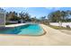 Inviting rectangular swimming pool in a fenced backyard at 7326 Shepherd St, Sarasota, FL 34243