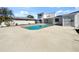 Inviting pool area with large patio and spacious backyard at 7326 Shepherd St, Sarasota, FL 34243