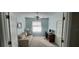 Cozy bedroom with a comfortable sofa and built-in workspace at 1835 Scarlett Ave, North Port, FL 34289