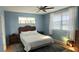 Bright bedroom with a ceiling fan and a large window at 1835 Scarlett Ave, North Port, FL 34289