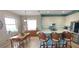 Kitchen with granite countertops, stainless steel appliances, and light wood cabinets at 1835 Scarlett Ave, North Port, FL 34289