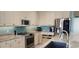 Spacious kitchen with stainless steel appliances and granite countertops at 1835 Scarlett Ave, North Port, FL 34289