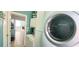 Convenient laundry room with washer, dryer, and extra storage at 1835 Scarlett Ave, North Port, FL 34289