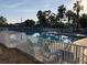 Inviting community pool with lounge chairs and a spa at 1835 Scarlett Ave, North Port, FL 34289