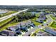 Two-story home in a community close to the highway with landscaping, ponds and sidewalks at 9189 Royal River Cir, Parrish, FL 34219