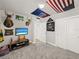 Spacious bedroom with American themed decorations at 9189 Royal River Cir, Parrish, FL 34219