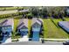 Two-story home featuring a two-car garage, well-manicured lawn, and neutral exterior paint at 9189 Royal River Cir, Parrish, FL 34219