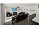 Cozy living room setup with hardwood floors and contemporary decor, offering a relaxing and inviting space at 9189 Royal River Cir, Parrish, FL 34219