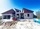 Block home under construction, showcasing unique roofline at 9468 Attica Cir, Port Charlotte, FL 33981