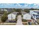 Aerial view of three-unit townhouse building with private driveway at 2607 W Cleveland St # B, Tampa, FL 33609