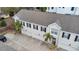 Aerial view of a row of townhouses with attached garages at 2607 W Cleveland St # B, Tampa, FL 33609
