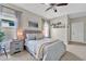Bedroom with queen bed, ceiling fan and built-in shelving at 2607 W Cleveland St # B, Tampa, FL 33609