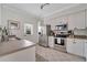 Modern kitchen with stainless steel appliances and white cabinets at 2607 W Cleveland St # B, Tampa, FL 33609