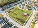 Community park with playground and open green space at 30350 Grymes Dr, Wesley Chapel, FL 33545
