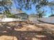 Home exterior with fenced yard and pool at 5220 Lords Ave, Sarasota, FL 34231