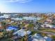 Aerial view of waterfront home with private dock at 8017 13Th S Ave, St Petersburg, FL 33707