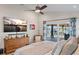 Main bedroom with large TV and water views at 8017 13Th S Ave, St Petersburg, FL 33707