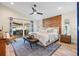 Main bedroom with wood feature wall and outdoor access at 8017 13Th S Ave, St Petersburg, FL 33707