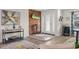 Bright entryway with wood-paneled accent wall at 8017 13Th S Ave, St Petersburg, FL 33707