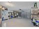 Two-car garage with epoxy floor and storage at 8017 13Th S Ave, St Petersburg, FL 33707