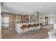 Modern kitchen with stainless steel appliances and large island with seating at 8017 13Th S Ave, St Petersburg, FL 33707