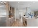 Modern kitchen with stainless steel appliances and an island with breakfast bar at 8017 13Th S Ave, St Petersburg, FL 33707