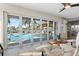 Living area showcasing access to the pool and patio at 8017 13Th S Ave, St Petersburg, FL 33707